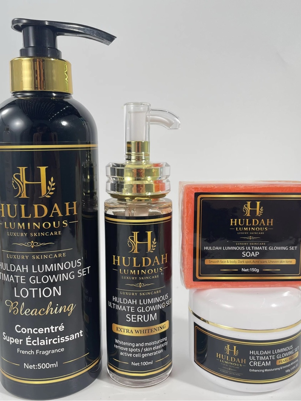 Huldah Luminous Ultimate Glowing Skincare Set — Black & Gold Bottles